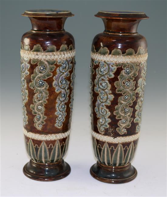 George Tinworth for Doulton Lambeth. A pair of stoneware vases, c.1871, height 32cm (12.5in.), one rim damaged